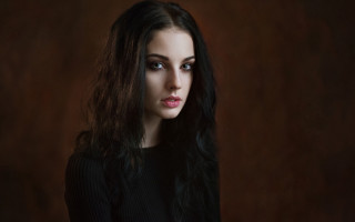 Gothic portrait woman blackshirt blueeyes - a brown background free wallpaper