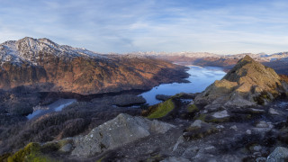 Mountain lake panoramic cloudy sky - a view of a mountain range free wallpaper