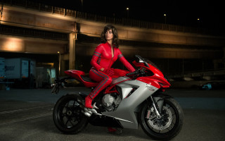 Afrofuturism woman motorcycle parking lot - a red outfit free wallpaper