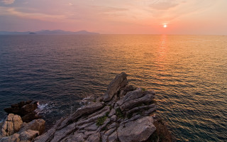 Sunset ocean rock mountains beach - sunset free wallpaper