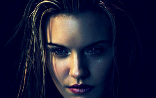 Woman black shirt serious face - dave kendall free wallpaper