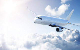 Large jetliner cloudy sky sun - bright free wallpaper