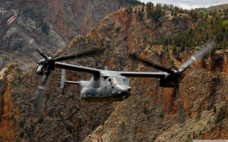 Military helicopter flying mountain flag - side and a mountain in the background free wallpaper