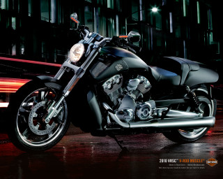 Motorcycle parked night building car - a building in the background free wallpaper