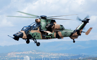 Military helicopter city hill clouds - a military helicopter free wallpaper