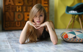 Elina karimova blonde blue eyes 2 - a chair in the background free wallpaper