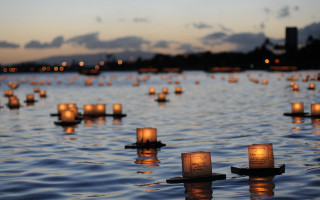 Candles floating watercity night sunset - a large body of water free wallpaper
