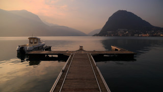 Lake mountains boat pier sunset - a cloudy sky above free wallpaper for desktop
