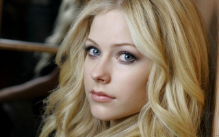 Blonde blueeyes serious photorealistic portrait - her face and shoulder free wallpaper