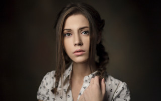 Woman braid dark room portrait - a braid free wallpaper