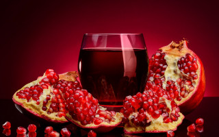 Wine pomegranate stilllife food photography - red background free wallpaper