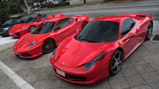 Red sports cars street corner - a row free wallpaper