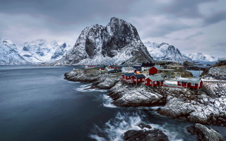 Small village rocky shore mountains - the background and a body of water free wallpaper