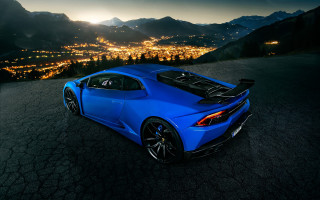 Blue sports car night city 2 - a city in the background free wallpaper