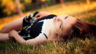 Woman laying grass blackwhite dress - claire falkenstein free wallpaper