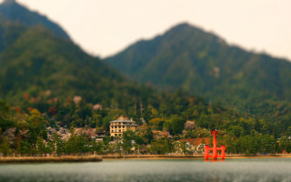 Red boat lake green mountains - a red boat free wallpaper