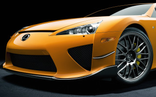 Yellow sports car dark room 11 - a yellow sports car free wallpaper