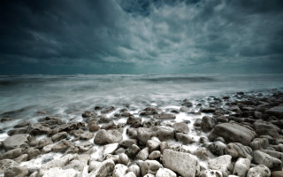 Rocky beach mountain horizon water 2 - a rocky beach free wallpaper