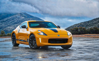 Yellow sports car mountains clouds 3 - a yellow sports car free wallpaper