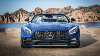 Blue mercedes benz roadster mountain - a lake in the background free wallpaper
