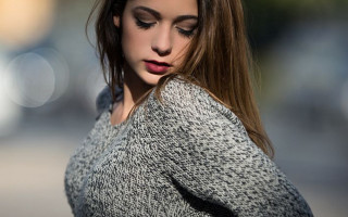 Woman longhair sweater lookingdown cellphone - long hair and a sweater free wallpaper