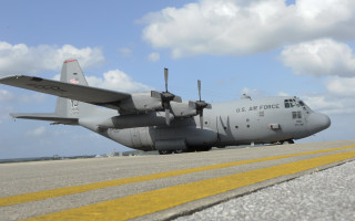 Airforce plane runway clouds sky - top of an airport runway free wallpaper