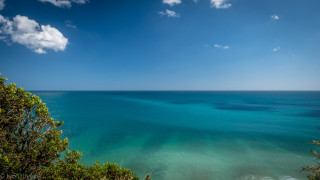Ocean hilltop view blue sky - exekia free wallpaper
