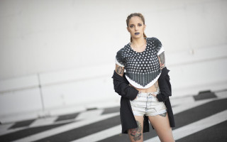 Tattooed woman streetcorner cellphone fashion - a street corner free wallpaper