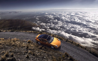 Car clouds mountains ocean planet - a view of the ocean free wallpaper