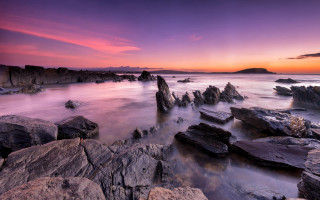 Rocky beach sunset pink sky 5 - a pink sky above free wallpaper