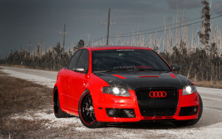 Red black car parked forest - car free wallpaper