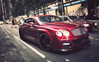Red car street tall building - andrew law free wallpaper