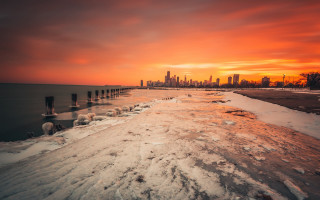 Snowy beach city sunset mountain - a matte painting free wallpaper for desktop