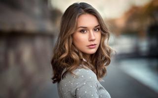 Woman long hair serious street - a street corner free wallpaper