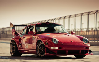 Red car bull headlight race - a bull free wallpaper
