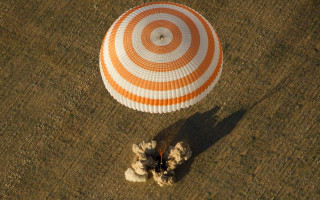 Parasail field shadow space art - a shadow of a person free wallpaper