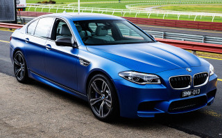 Blue bmw car race track - a blue bmw car free wallpaper
