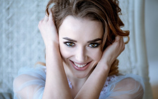Smiling woman blue eyes hands - daphne mcclure free wallpaper