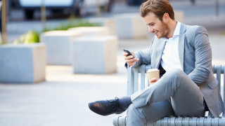 Man sitting coffee cellphone blurry - derek zabrocki free wallpaper