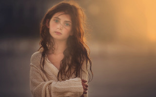 Woman curly hair sweater portrait - long hair and a sweater free wallpaper