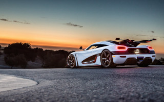 White sports car sunset bike - the side of a road free wallpaper