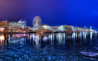 City skyline ferriswheel night water - a blue sky and water free wallpaper