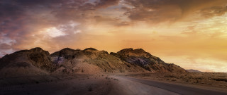 Desert road mountains cloudy sky - amir zand free wallpaper