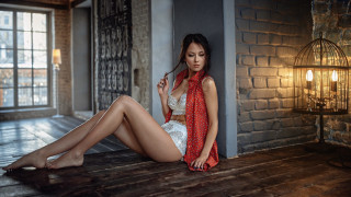 Woman sitting brickwall redscarf fashion - a red scarf free wallpaper