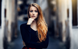 Red haired woman alleyway portrait - long red hair free wallpaper