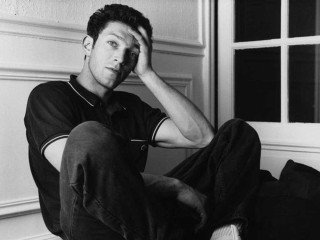 Man sitting floor hands on - david annand free wallpaper
