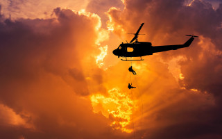 Helicopter lowered by man sunset - a helicopter free wallpaper
