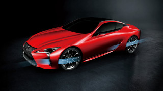 Red sports car dark room 31 - a red sports car free wallpaper
