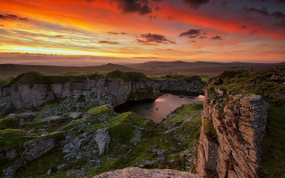Cliff lake sunset cityscape mountains - a red sky above free wallpaper