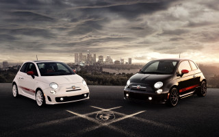 Small cars parking lot city - sunset free wallpaper